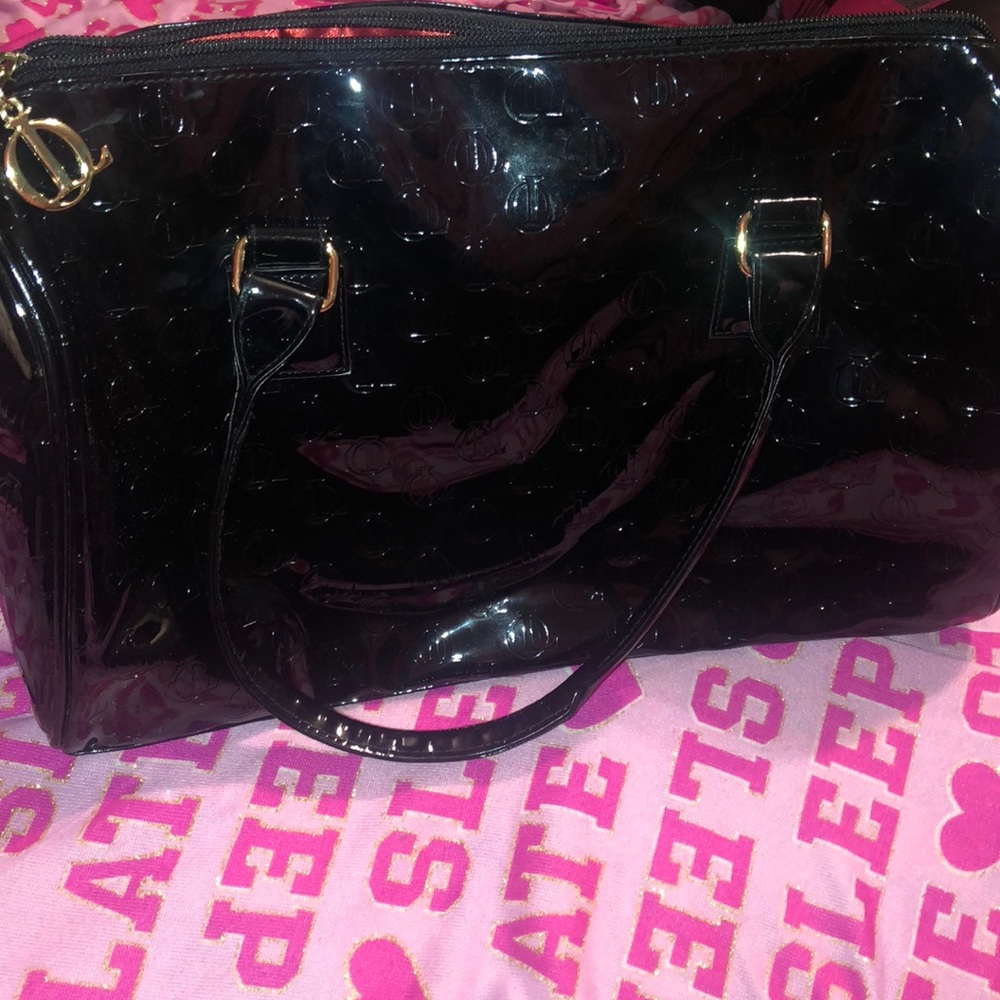 Queen Latifa makeup bag